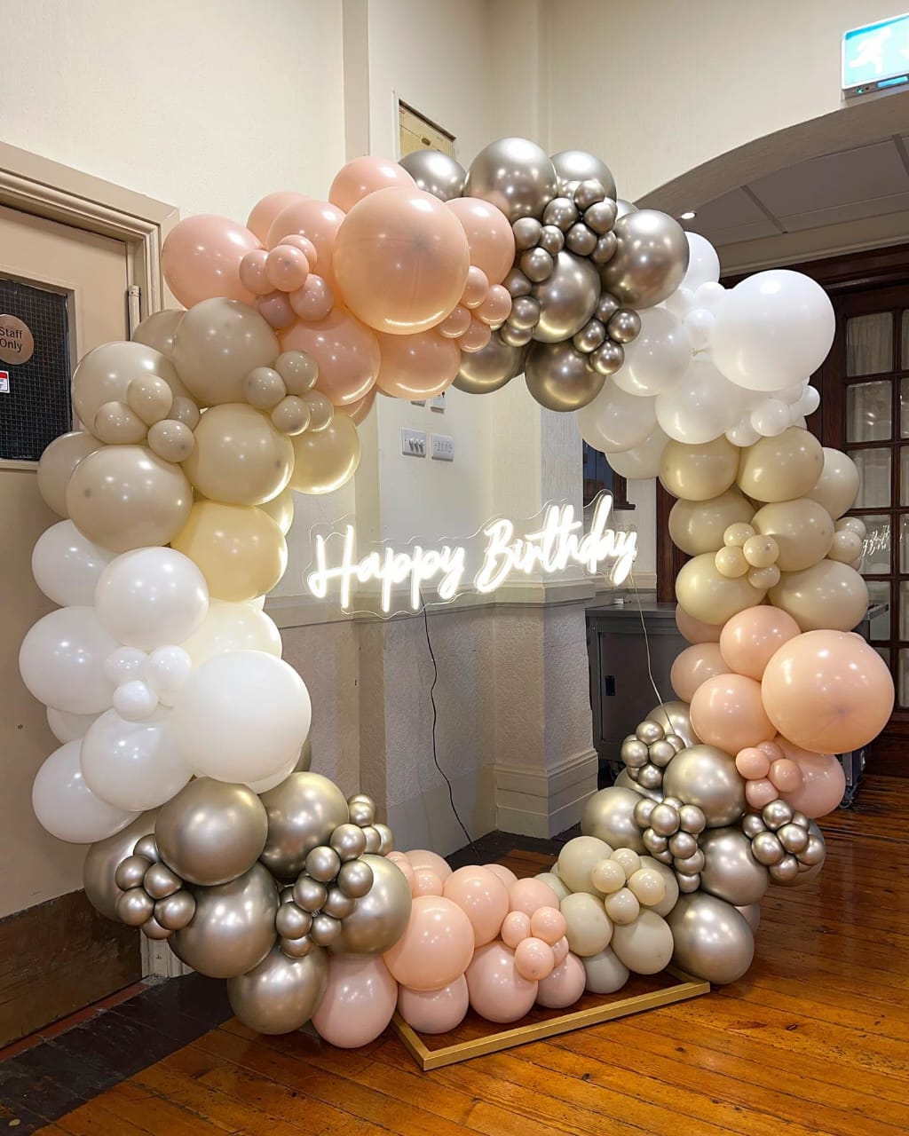 Modern Neutral Balloon Arch Birthday Backdrop with Gold and Peach Balloons