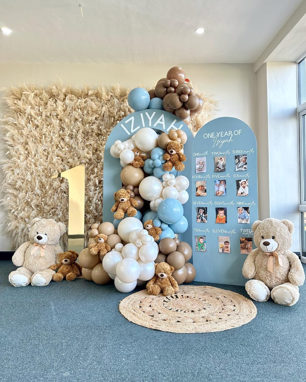 Blue and Beige Teddy Bear First Birthday Decor with Balloon Arch and Pampas Wall