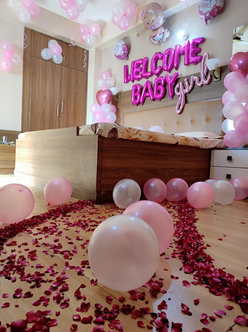 Welcome Baby Girl Pink And White Balloon Room Decoration With Rose Petals - welcome baby decoration by ARV Decor