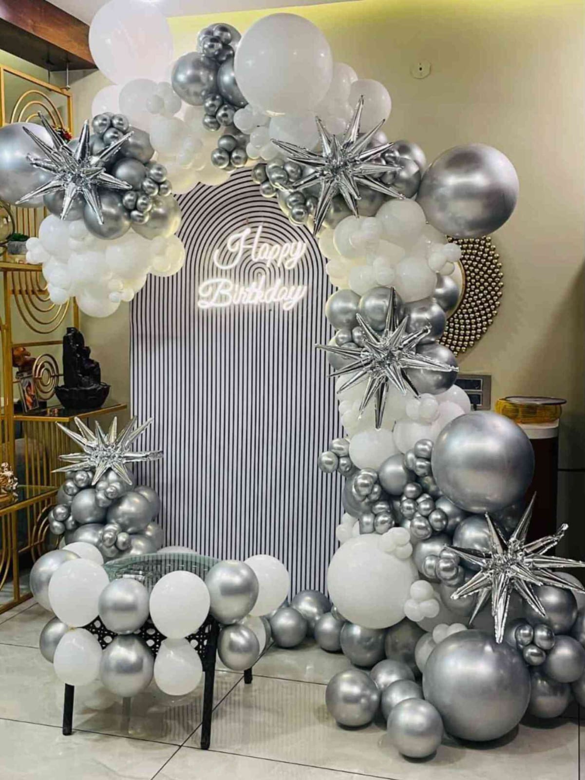Modern Silver And White Birthday Balloon Arch With Neon Backdrop