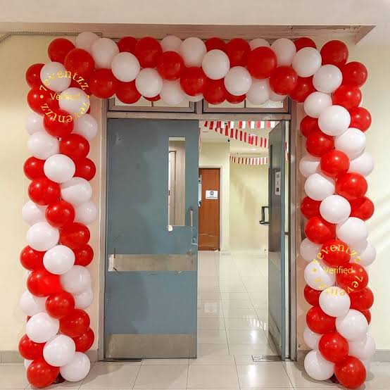 Red & White Door Arch – balloon and flower decoration by ARVDecor