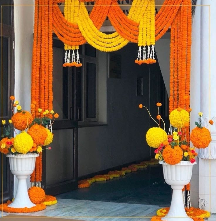 Marigold Doorway Decor – balloon and flower decoration by ARVDecor
