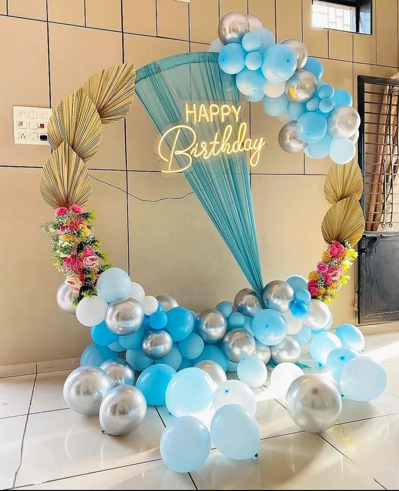 Sky Blue & Gold Backdrop – balloon and flower decoration by ARVDecor
